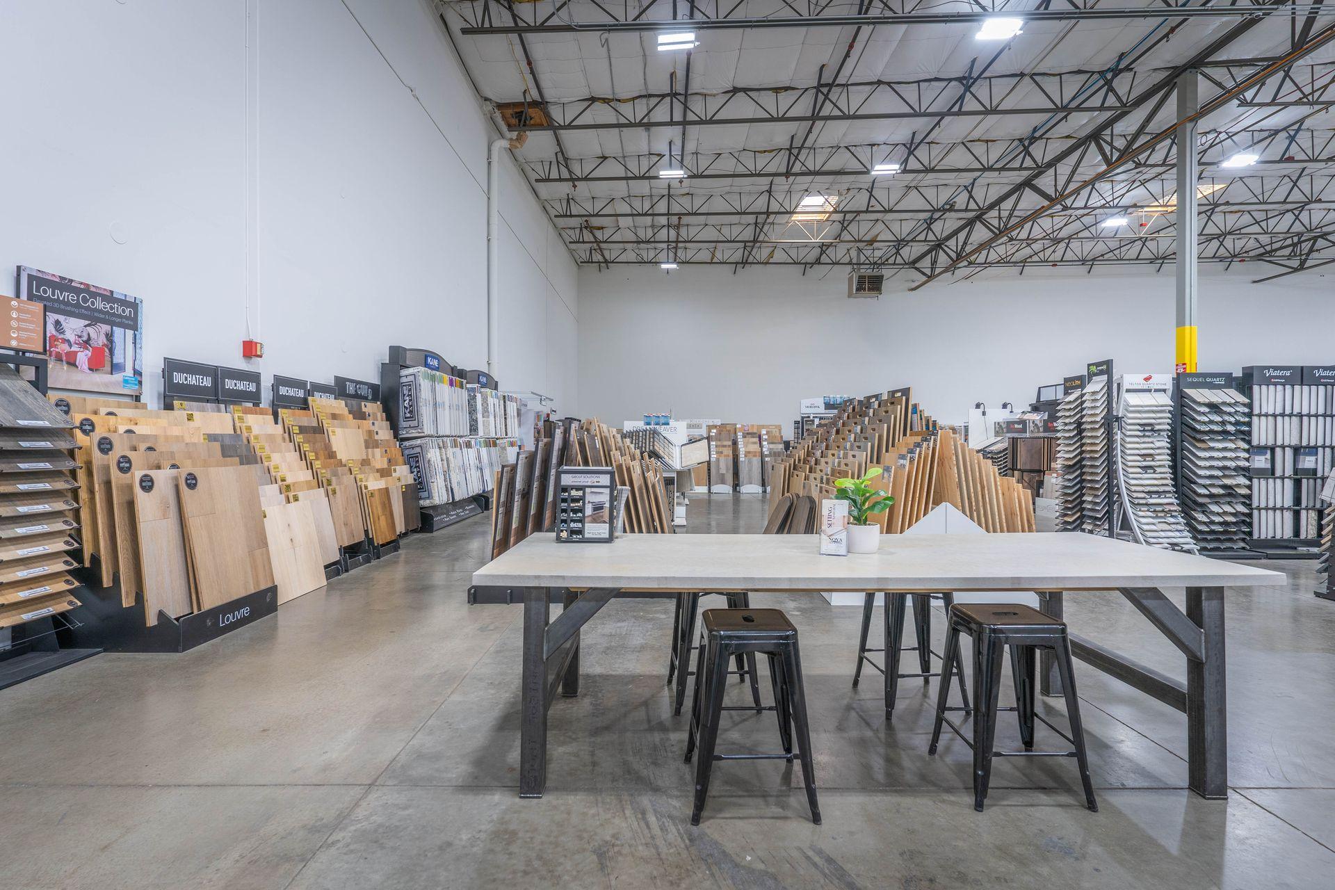 Nova Tile and Stone Reno showroom interior with flooring samples and consultation table
