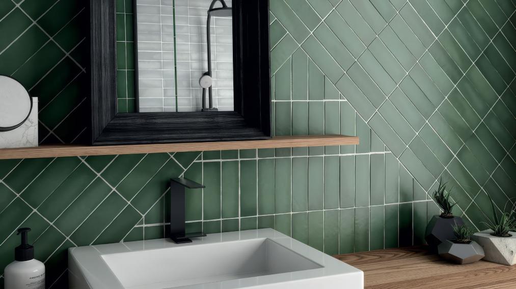 Modern bathroom with matte green ceramic tiles