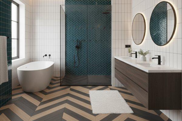 Modern luxury bathroom featuring a wall with multiple subway tile patterns in contrasting white and gray: vertical stack on the shower wall, chevron on the vanity wall, and herringbone on the floor