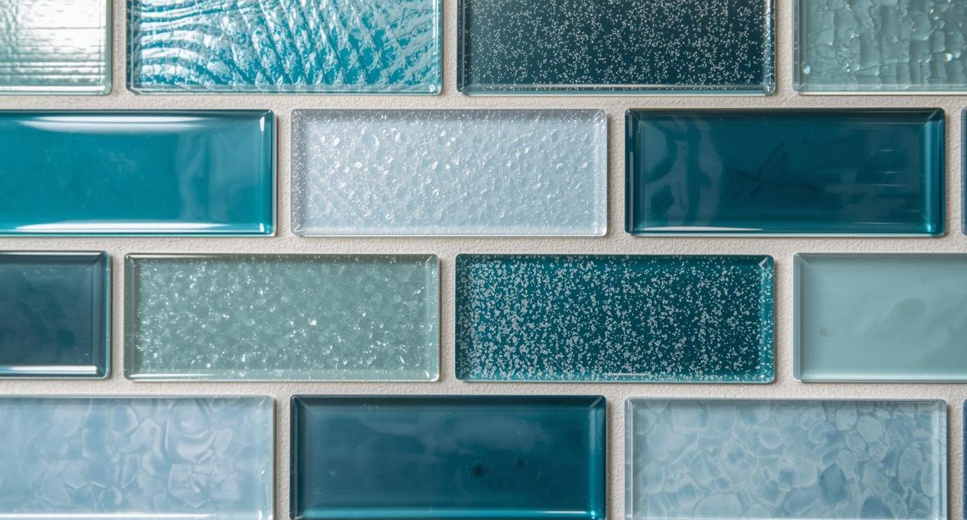 Glass subway tile in standard installation pattern