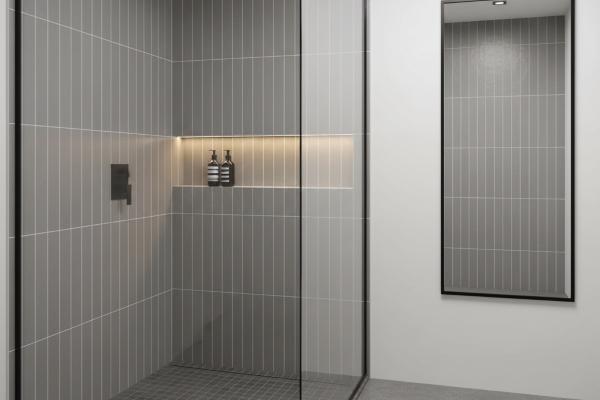 Contemporary bathroom shower with matte gray subway tiles in vertical stacked pattern