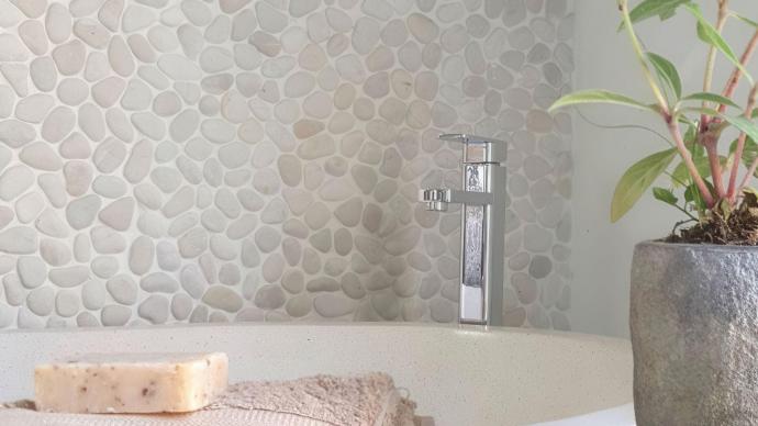 Ivory blend pebbles natural stone river rock mosaic tile.