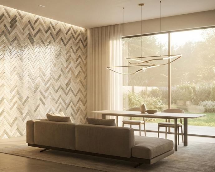 Herringbone pattern layout using 4x16 subway tiles creating dynamic visual interest on accent wall