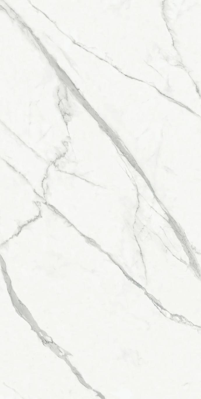 Extra Statuario porcelain slabs surface detail displaying classic white marble look with elegant veins.