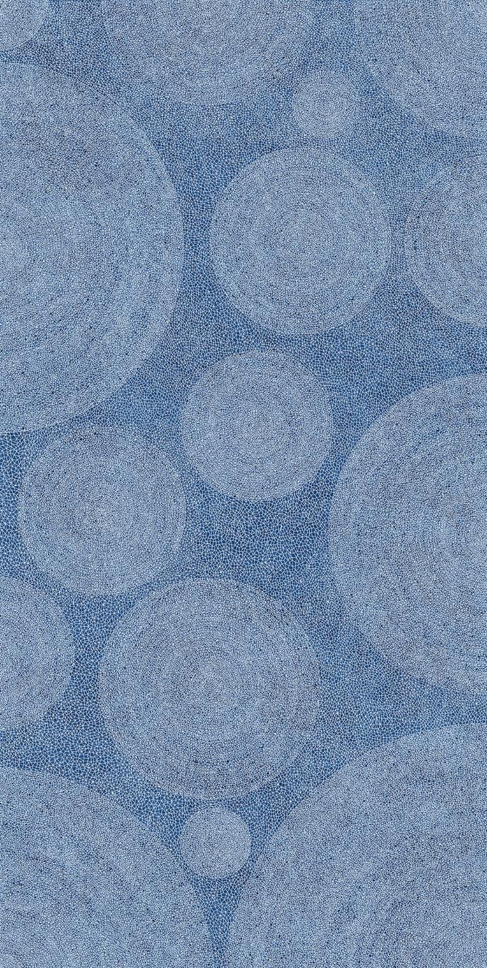 Holos Aegean Blue Porcelain Slabs showing circular mosaic pattern in Mediterranean blue tones.