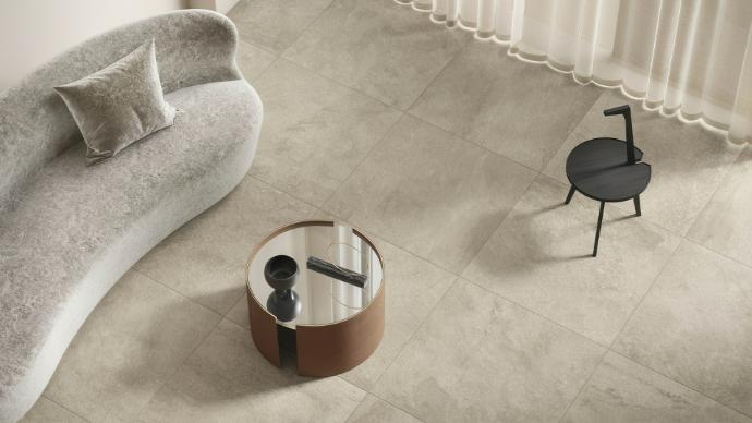 Beige porcelain tile Beige porcelain tile floor in modern living room