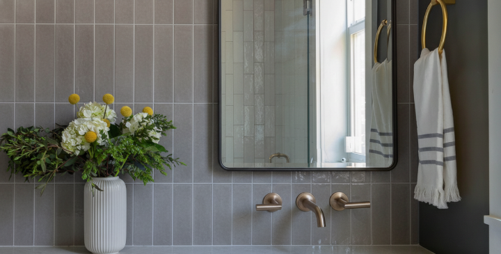 Matte gray subway tile in stacked vertical layout for bathroom walls