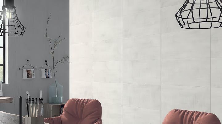 Large format white porcelain wall tile with concrete finish