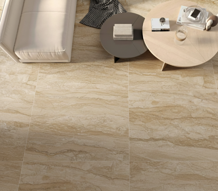 Beige travertine-look porcelain tile in modern living space Modern living room with beige travertine tile flooring and contemporary round coffee tables