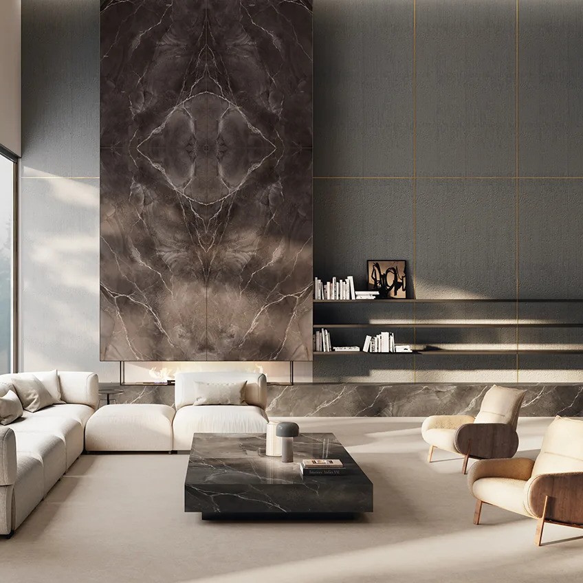 Modern living room with Andromeda porcelain slabs on feature wall and flooring.
