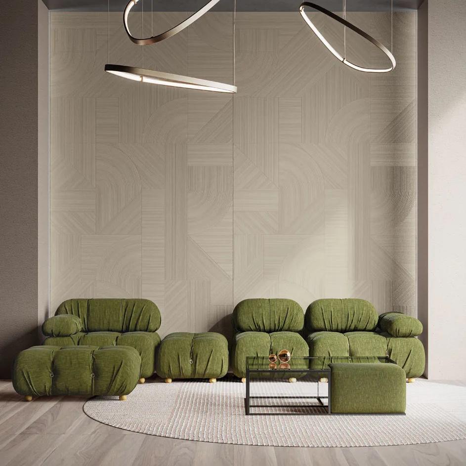 Bercy porcelain slabs creating sophisticated grey wall backdrop in contemporary living room design.