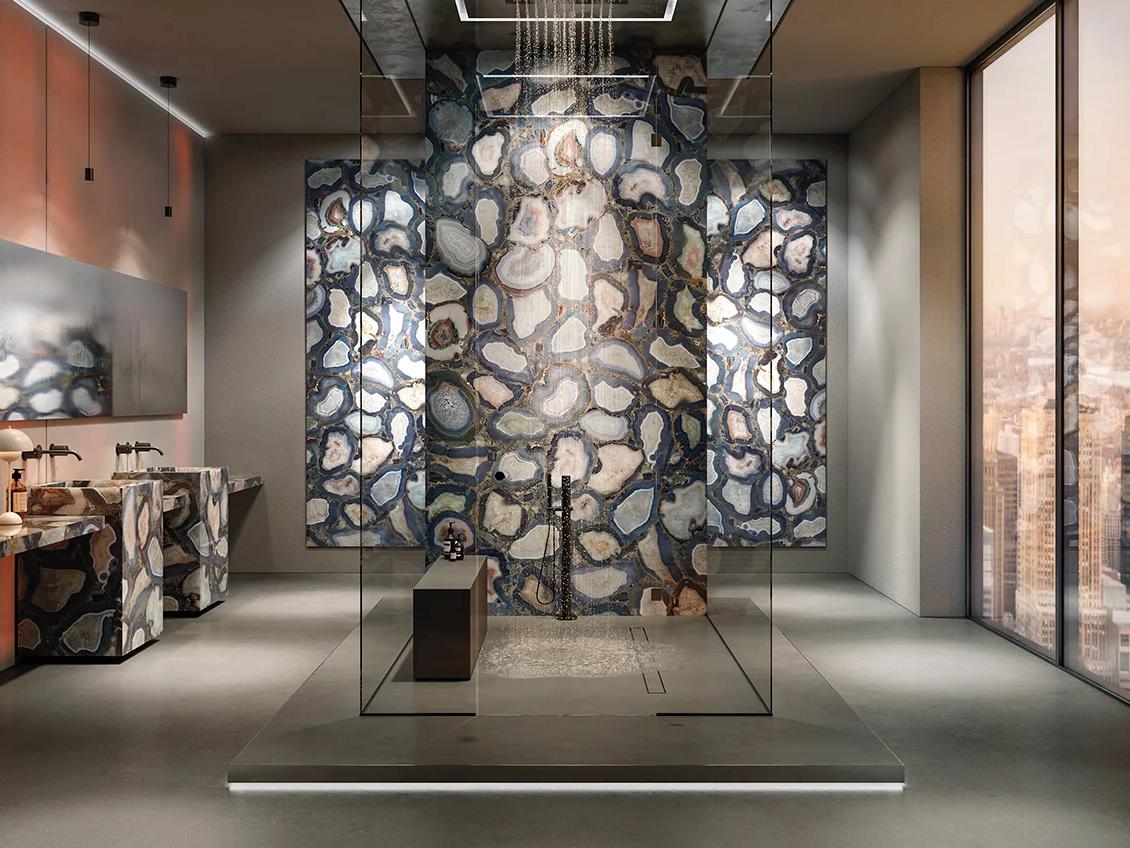 Modern shower room with floor-to-ceiling Cammeo porcelain slabs in an agate design.