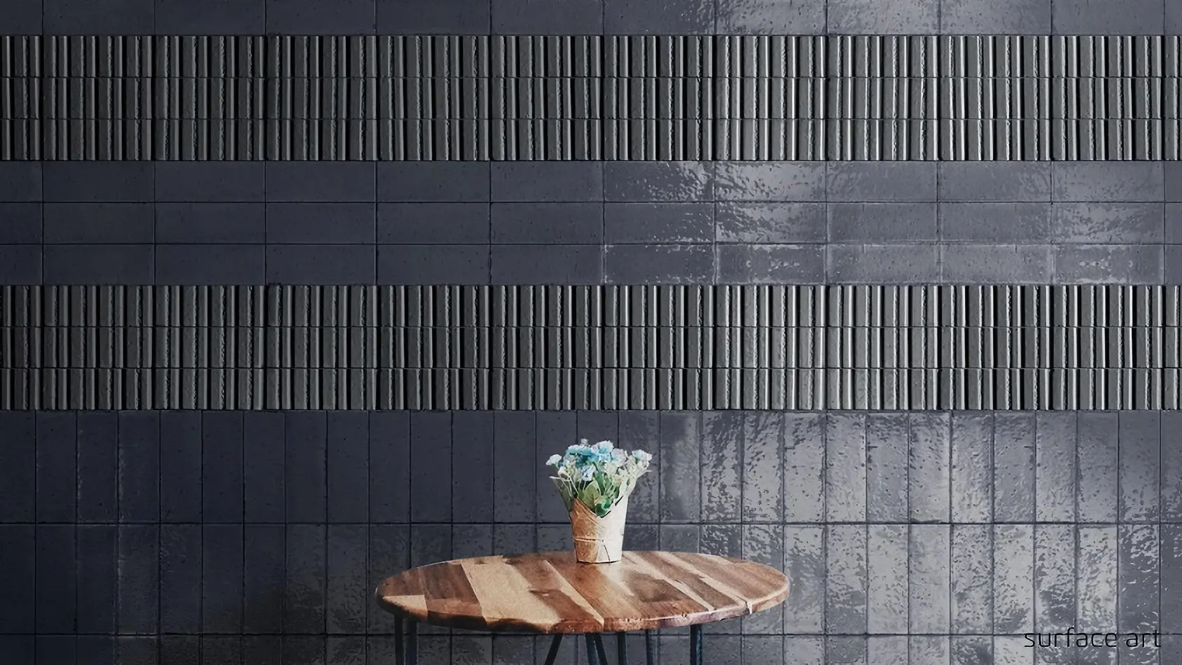 Dark glossy and textured black porcelain subway tiles installed