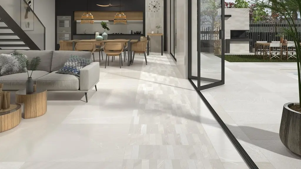 Light tile flooring in an open-plan home showing the cost-effective appeal of subway tiles